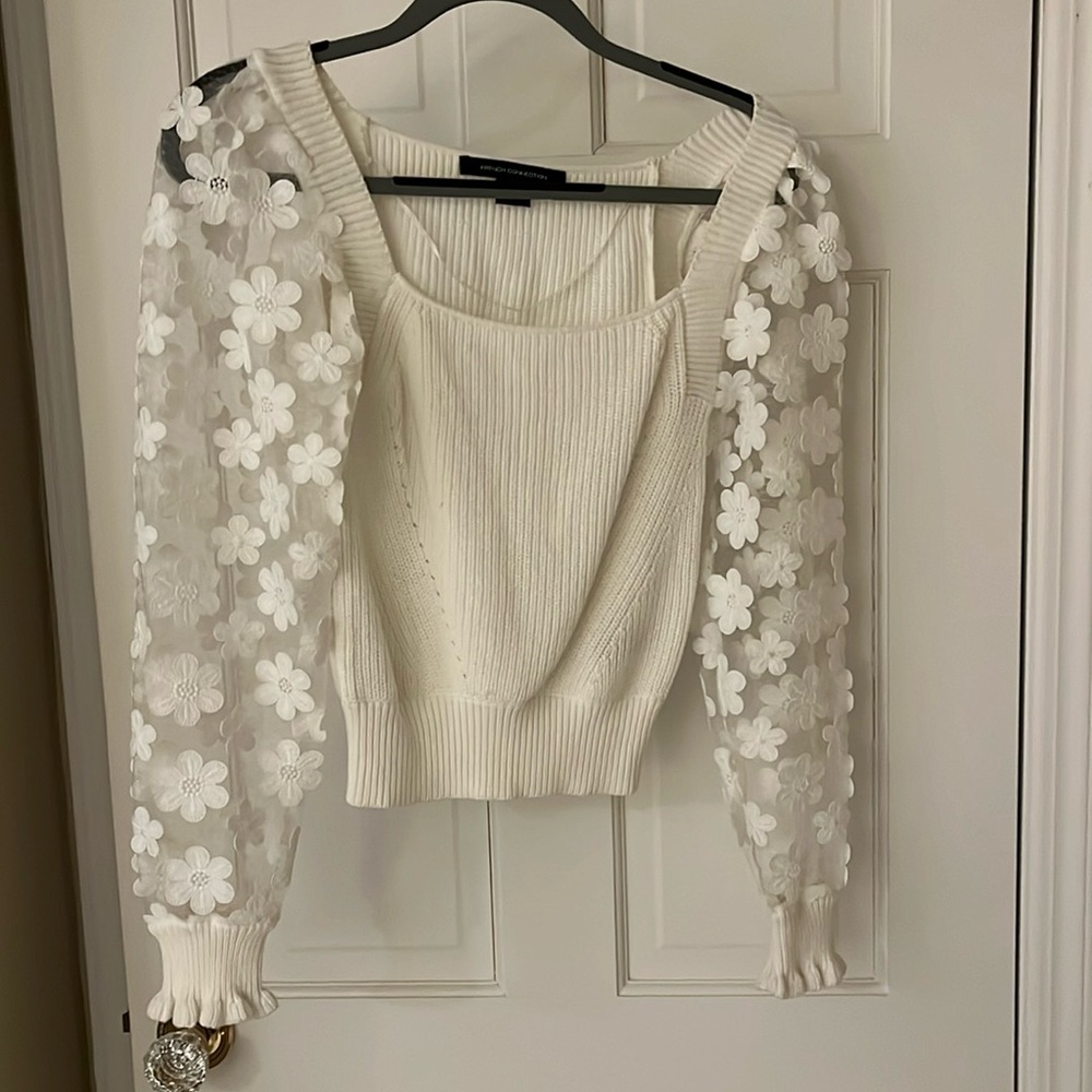 French Connection like new knit sweater with sheer sleeves, floral appliqué.